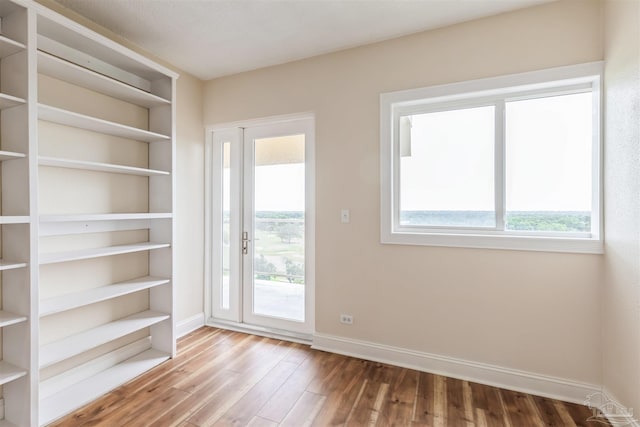 doorway to outside featuring hardwood / wood-style flooring