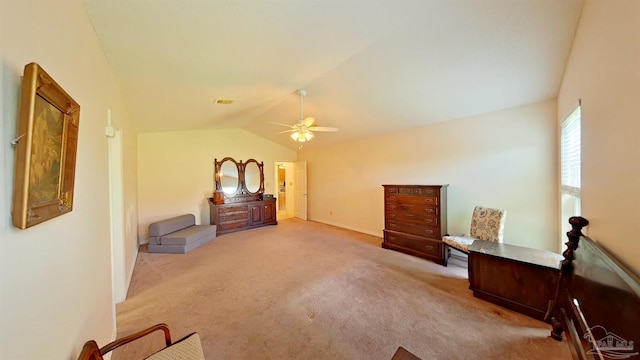 bedroom with lofted ceiling, light carpet, and ceiling fan