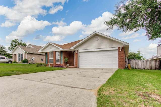 7909 Red Bean Dr, Pensacola, FL 32526 - ranch-style house with brick siding, an attached garage, and concrete driveway