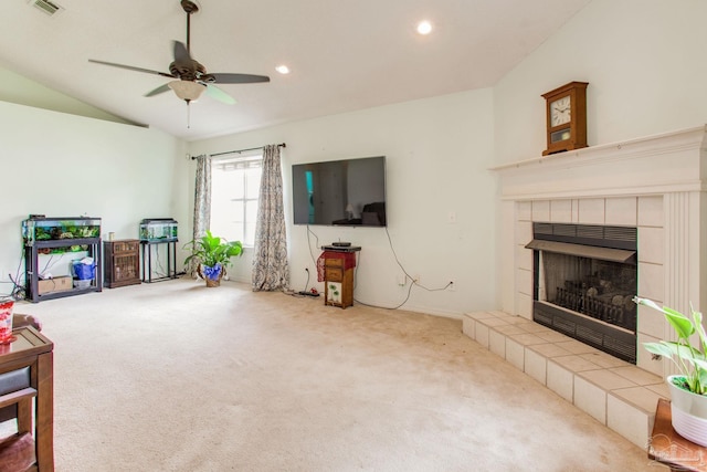 7909 Red Bean Dr, Pensacola, FL 32526 - carpeted living area with ceiling fan, vaulted ceiling, a tiled fireplace, and recessed lighting