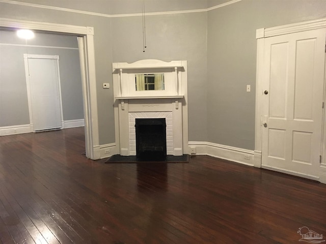 unfurnished living room featuring a fireplace and dark hardwood / wood-style floors