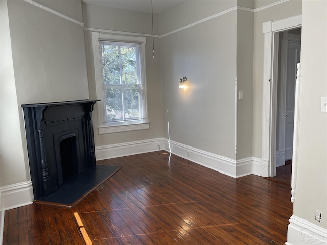 unfurnished living room with dark wood-type flooring