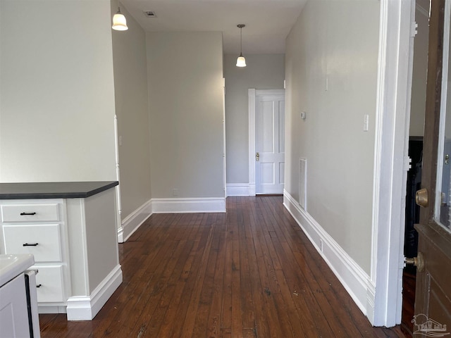 hall featuring dark hardwood / wood-style flooring