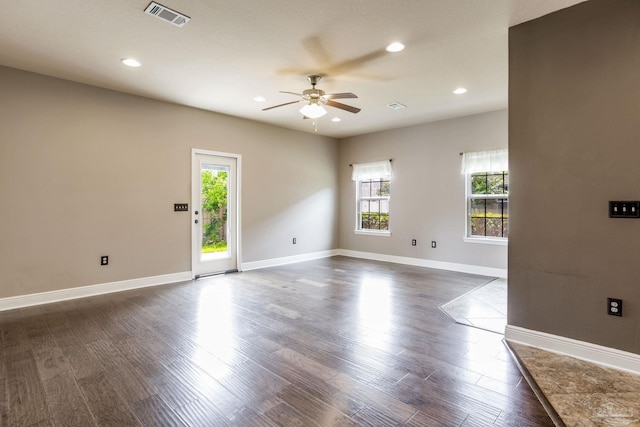 2107 Wilsons Plover Cir, Navarre, FL 32566 - unfurnished room with ceiling fan, plenty of natural light, dark wood finished floors, baseboards, and recessed lighting