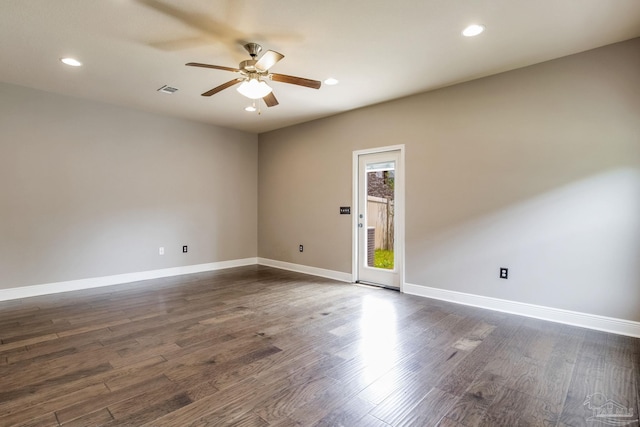 2107 Wilsons Plover Cir, Navarre, FL 32566 - unfurnished room with a ceiling fan, recessed lighting, dark wood-style floors, and baseboards