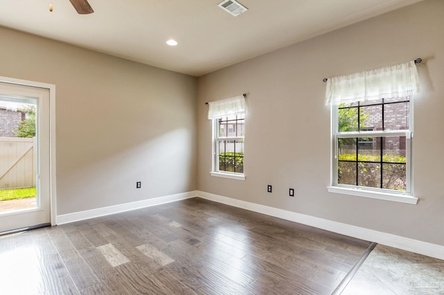 2107 Wilsons Plover Cir, Navarre, FL 32566 - empty room with wood finished floors, baseboards, recessed lighting, and a ceiling fan