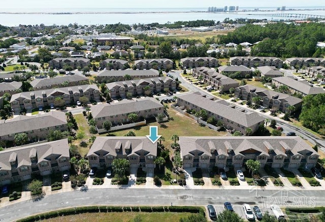 2107 Wilsons Plover Cir, Navarre, FL 32566 - aerial view of property and surrounding area with a nearby body of water, a notable bridge, and nearby suburban area