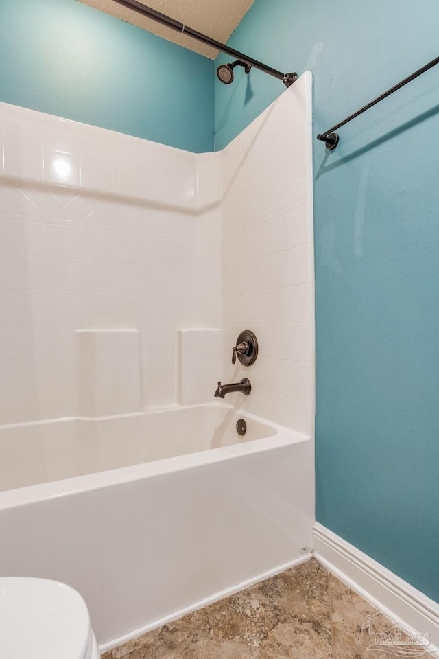2107 Wilsons Plover Cir, Navarre, FL 32566 - bathroom with shower / tub combination, toilet, and baseboards