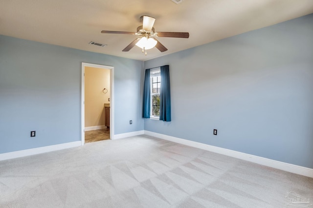 2107 Wilsons Plover Cir, Navarre, FL 32566 - unfurnished room with light colored carpet, a ceiling fan, and baseboards
