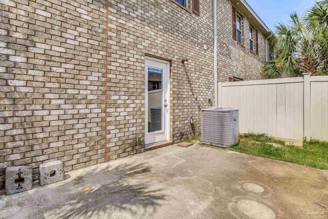 2107 Wilsons Plover Cir, Navarre, FL 32566 - view of patio with central air condition unit