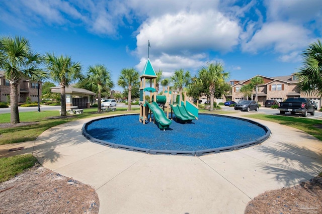 2107 Wilsons Plover Cir, Navarre, FL 32566 - community playground featuring a residential view