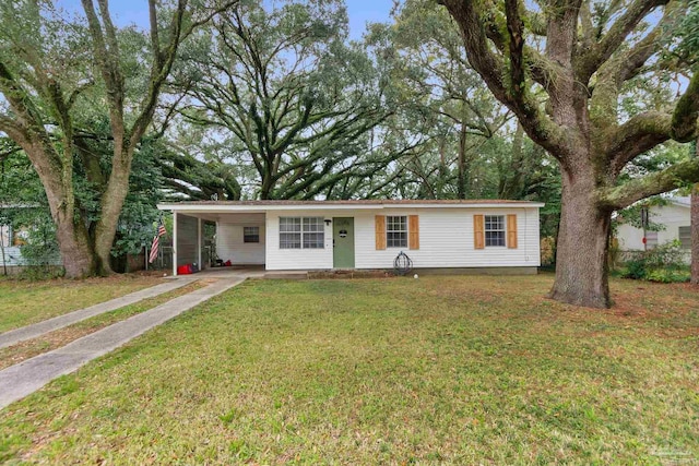 view of front of property featuring a carport and a front lawn