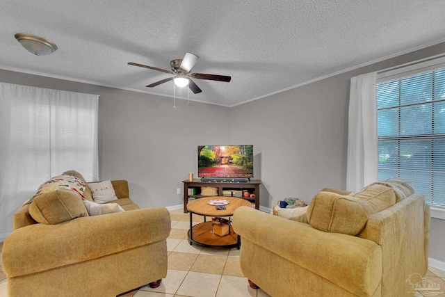 living room featuring light tile patterned floors, a wealth of natural light, ceiling fan, and crown molding