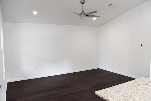 unfurnished room with dark wood finished floors, recessed lighting, baseboards, and ceiling fan