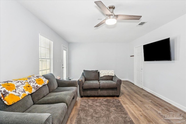 7244 Frankfort St, Navarre, FL 32566 - living room with wood-type flooring and ceiling fan