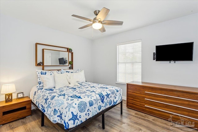 7244 Frankfort St, Navarre, FL 32566 - bedroom with wood-type flooring and ceiling fan