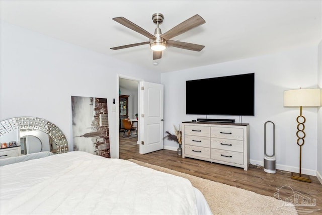 7244 Frankfort St, Navarre, FL 32566 - bedroom featuring dark wood-type flooring and ceiling fan