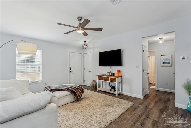 7244 Frankfort St, Navarre, FL 32566 - living room featuring ceiling fan and dark hardwood / wood-style floors