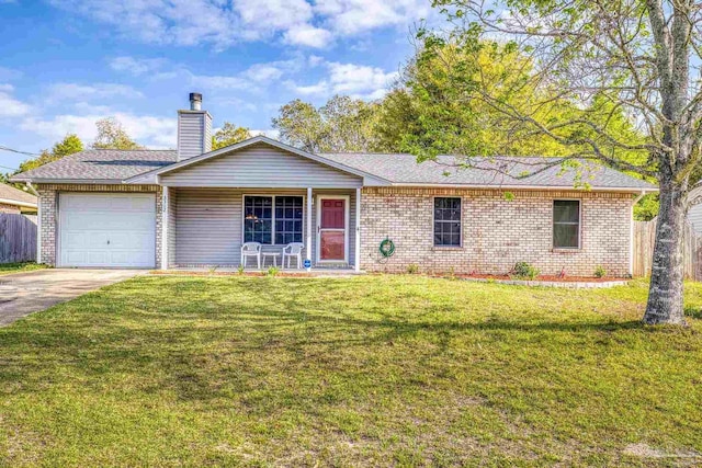 5362 Barbarosa Rd, Gulf Breeze, FL 32563 - single story home with a front lawn, a porch, concrete driveway, fence, and a garage