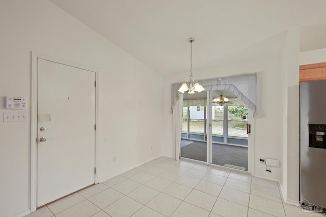 5362 Barbarosa Rd, Gulf Breeze, FL 32563 - unfurnished dining area with light tile patterned flooring, baseboards, and a notable chandelier