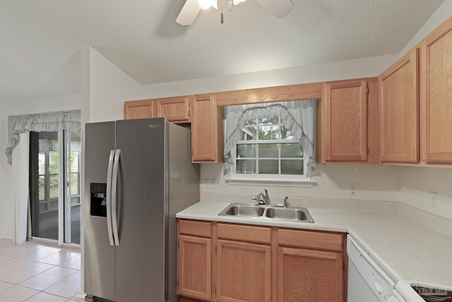5362 Barbarosa Rd, Gulf Breeze, FL 32563 - kitchen with light countertops, a sink, stainless steel fridge, and a healthy amount of sunlight