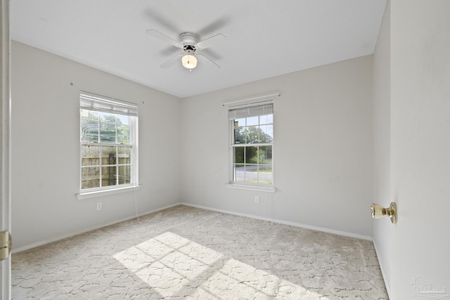 5362 Barbarosa Rd, Gulf Breeze, FL 32563 - carpeted empty room with a ceiling fan and baseboards