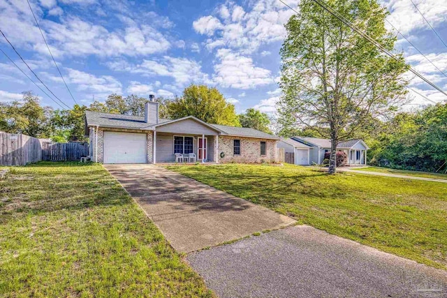 5362 Barbarosa Rd, Gulf Breeze, FL 32563 - ranch-style home featuring driveway, a chimney, fence, a garage, and a front yard