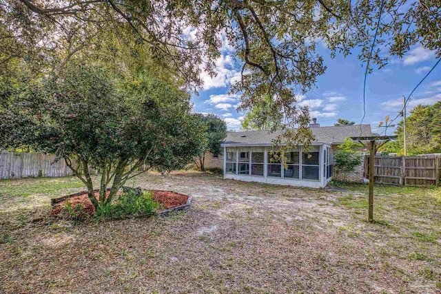 5362 Barbarosa Rd, Gulf Breeze, FL 32563 - view of yard featuring a fenced backyard and a sunroom