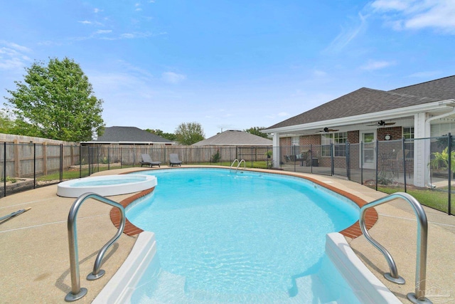 view of pool with an in ground hot tub, a ceiling fan, a fenced in pool, a fenced backyard, and a patio
