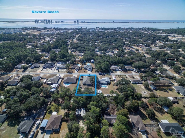 bird's eye view with a water view and a residential view