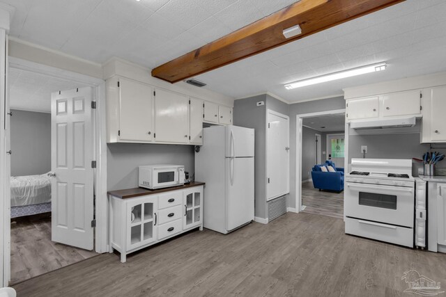 kitchen with light wood-type flooring, crown molding, white cabinetry, and white appliances