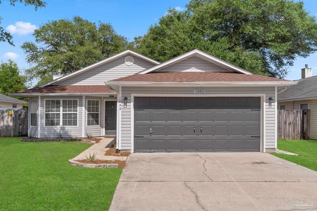 1042 Simpson St, Pensacola, FL 32526 - single story home with an attached garage, concrete driveway, and a shingled roof