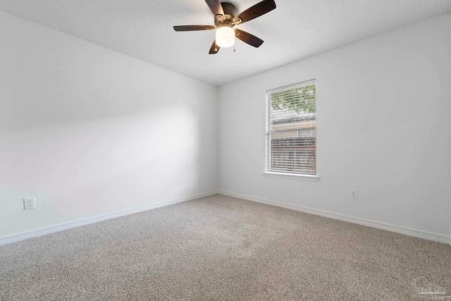 1042 Simpson St, Pensacola, FL 32526 - carpeted spare room with baseboards, a ceiling fan, and a textured ceiling