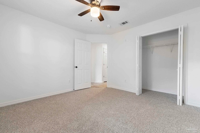 1042 Simpson St, Pensacola, FL 32526 - unfurnished bedroom featuring light carpet, baseboards, a closet, and ceiling fan