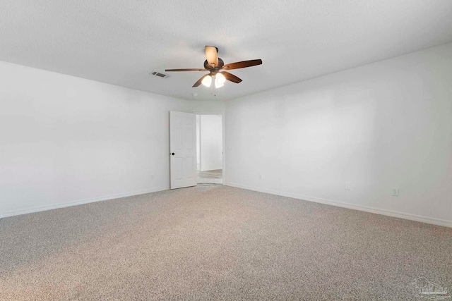 1042 Simpson St, Pensacola, FL 32526 - unfurnished room featuring light carpet, a ceiling fan, and baseboards