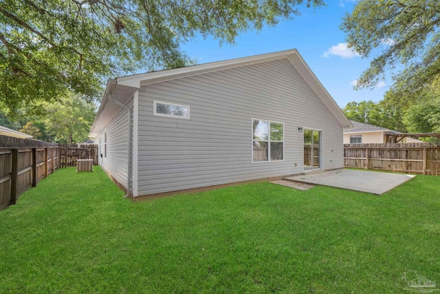 1042 Simpson St, Pensacola, FL 32526 - back of property with a patio and central AC