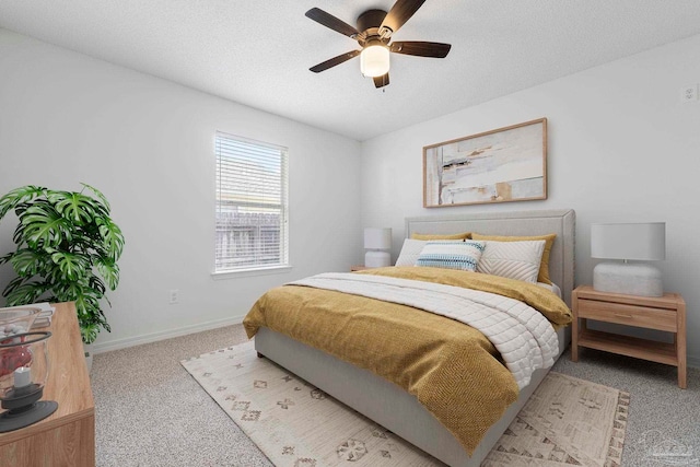 1042 Simpson St, Pensacola, FL 32526 - bedroom with carpet floors, baseboards, ceiling fan, and a textured ceiling