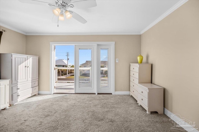 carpeted bedroom with access to outside, ceiling fan, and crown molding