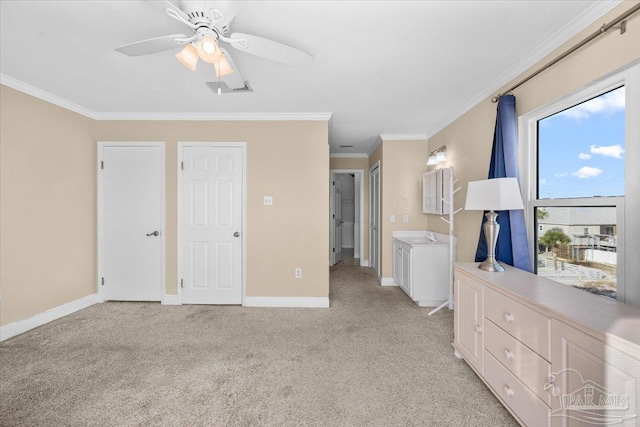 unfurnished bedroom with ceiling fan, ornamental molding, light carpet, and ensuite bath