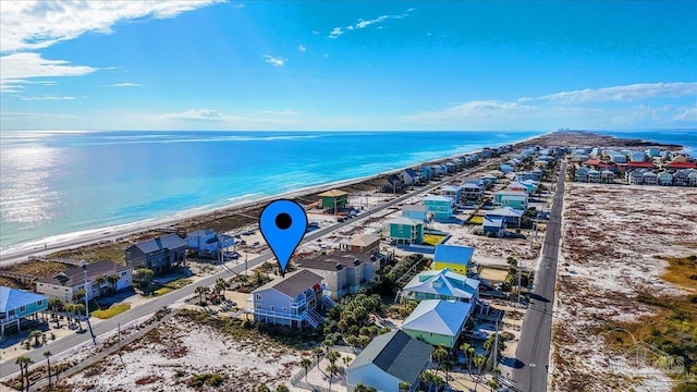 aerial view with a view of the beach and a water view