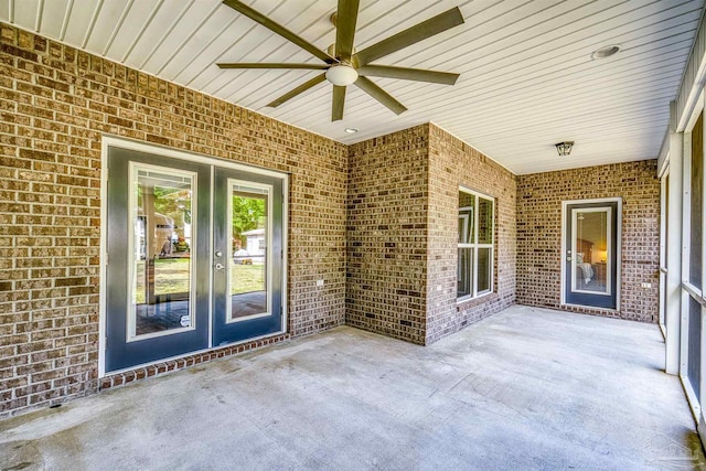 view of patio featuring a ceiling fan and french doors