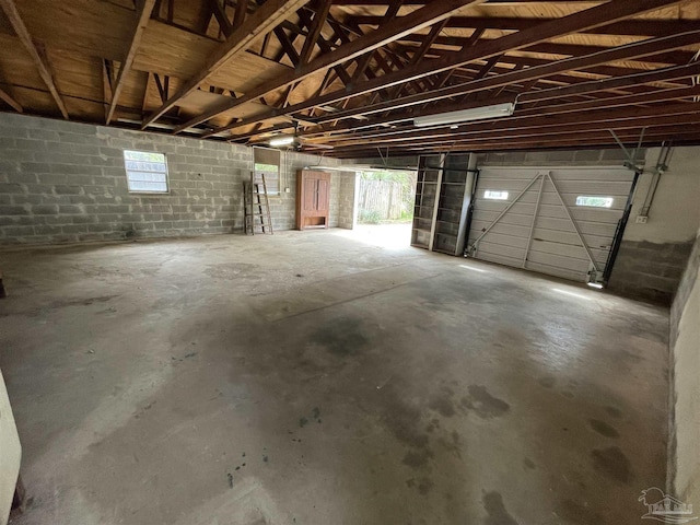 garage featuring concrete block wall