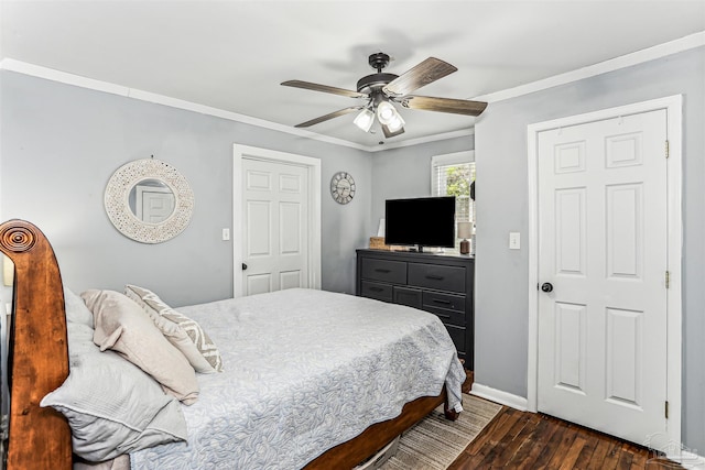 bedroom with baseboards, dark wood finished floors, ornamental molding, and ceiling fan