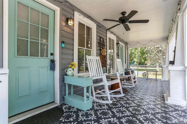 view of patio with a porch and ceiling fan