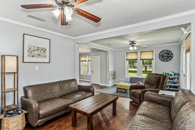 living room with visible vents, crown molding, baseboards, ceiling fan, and dark wood-type flooring