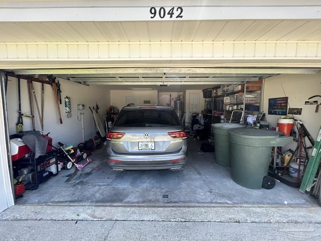 garage featuring gas water heater