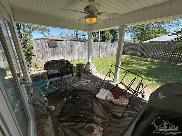 view of patio / terrace featuring ceiling fan and a fenced backyard