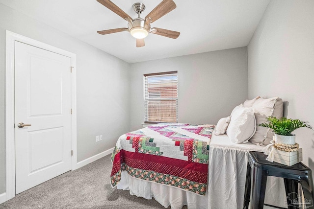 bedroom with ceiling fan and carpet flooring