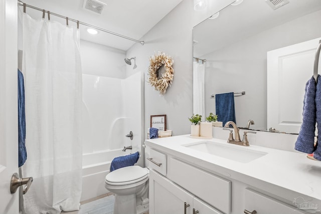 full bathroom with wood-type flooring, vanity, shower / tub combo, and toilet