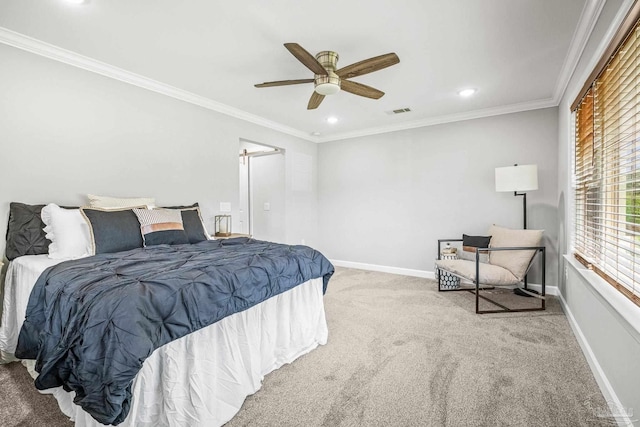 bedroom featuring carpet floors, crown molding, and ceiling fan